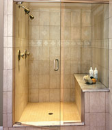 shower benchseat with a frameless shower door system 
