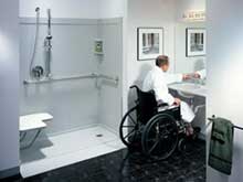 roll in shower with a hand held shower and recessed soap niche 
