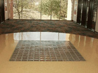 glass block floor surrounded by tile