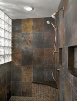 inside view of hand held and wall mounted shower units and glass block shower system