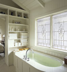 Designer soaker tub windows with decorative glass 