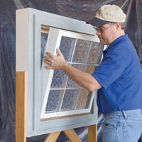 replacement acrylic block window being installed 