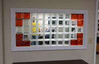 interior window in a commercial building using clear & colored glass blocks