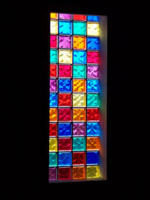 inside view of church windows with various colors 