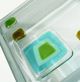 close up view of a glass tile art block