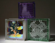 dichroic glass block with a decorative etching in it