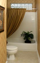 transom window above a tub in a kids bathroom