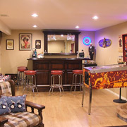 Man cave with a wet bar and pinball machine in cleveland ohio