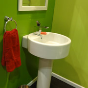 cool contemporary pedestal sink in a small bath in cleveland