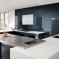 Carbon black high gloss walls in a modern kitchen 
