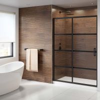 Bypass shower doors and a contemporary wall system  in matte black - The Bath Doctor - downtown Cleveland 