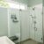 Arctic white high gloss shower wall panels in a luxury shower - Moreland Hills Ohio - The Bath Doctor 
