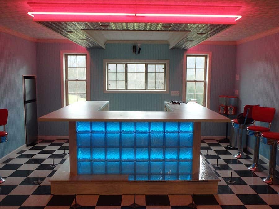 Glass block bar with LED lights behind it in a rec room - Columbus Glass Block 
