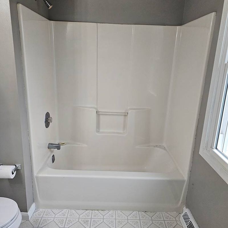 BEFORE - outdated shower/tub conversion