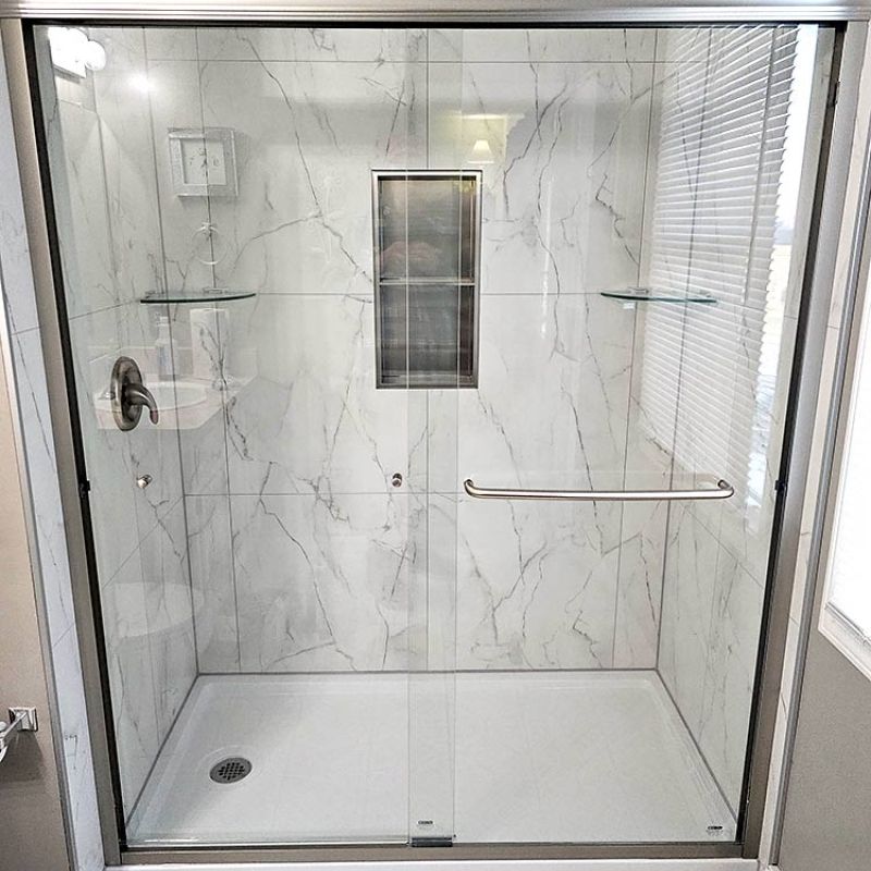 AFTER - shower, bianco marble wall panels with niche, new shoer base, glass doors