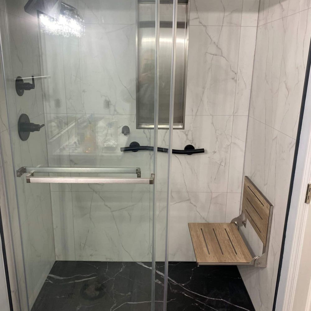 Secret 8 Weathered Teak Fold Down Seat Low Profile Black Marble Shower Pan 1 Scaled
