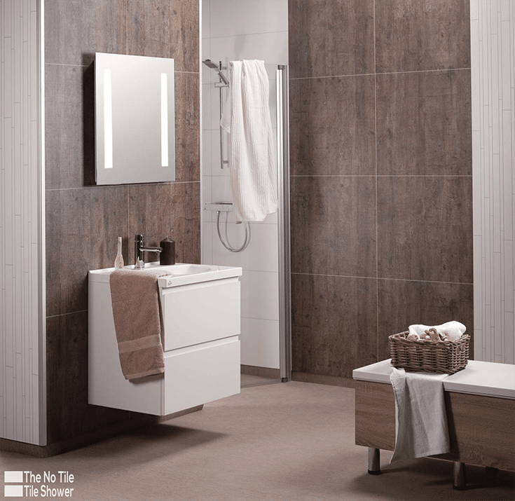 updated bathroom with laminate grout free shower wall panels | Innovate Building Solutions | Innovate Builders Blog | #BathroomRemodel #Laminatewallpanels #GroutFreePanels 