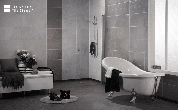 Stone look laminate shower and bathroom wall panels | Innovate Building Solutions | Innovate Builders Blog | #Laminatewallpanels #BathroomRemodel #StoneShowerDesign #Greybathrooms