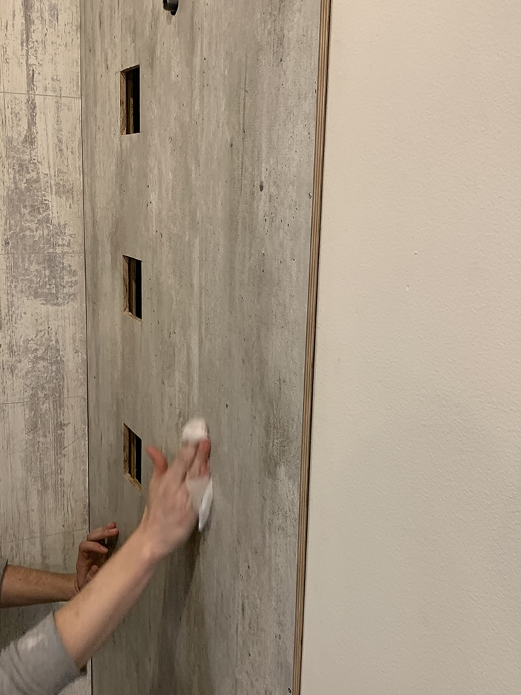 Waterproof laminate panels being installed | Innovate Builders Blog | Innovate Building Solutions | #Laminatewallpanels #WallPanels #InstallingWallpanels