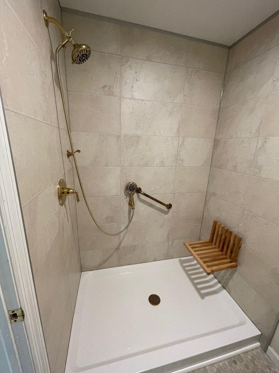 Question 5 credit Anew Bath Concepts Kathy Green Greige Slate Laminate Wall panels | Innovate Building Solutions #ShowerRemodel #ShowerWalls #BathroomRemodel