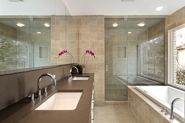 Master bathroom remodel in a vacation home rental  | Innovate Building Solutions | Multi Unit | #LuxuryRentals #VacationRentals #BathroomDesign #GlassBathroomDoor