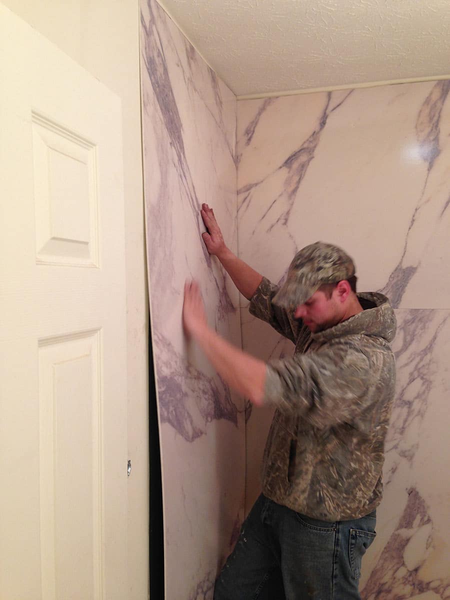 Installing PVC composite shower wall panels with a marble pattern | Innovate Building Solutions | #PVCWalls #ShowerWallPanels #Installation