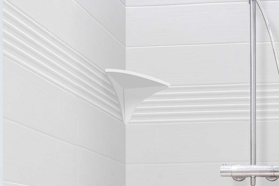 https://innovatebuildingsolutions.com/multi-unit-bathrooms/wp-content/uploads/2022/07/close-up-of-the-shower-shelf-accessory.jpg