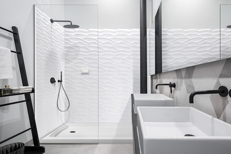 Criterion 7 wave cultured marbel wall panels and matching shower pan | Innovate Building Solutions #CulturedMarbleWallPanels #CulturedMarbleShower #ShowerWalls