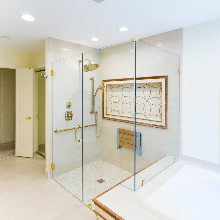 Frameless glass shower doors in a roll in tile shower - The Bath Doctor Shaker Heights Ohio 