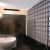 Bronze and frosted glass blocks in a tiled bathroom - Innovate Building Solutions 