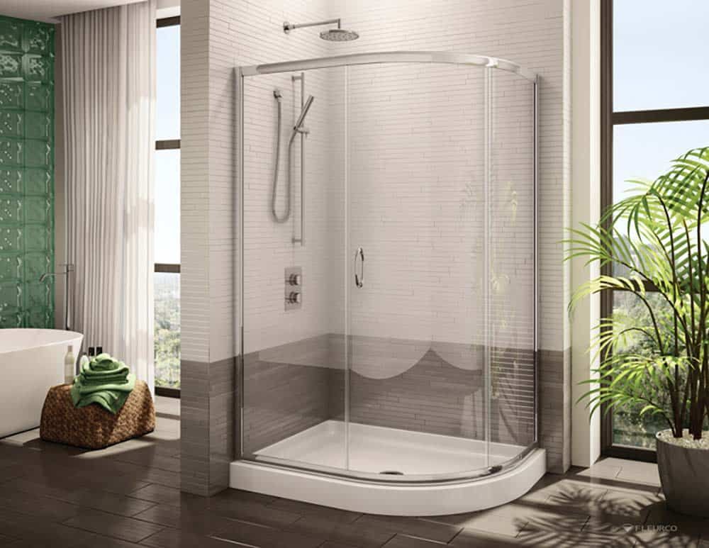 36 x 48 round acrylic shower pan with a curved pivoting glass enclosure by Innovate Building Solutions 