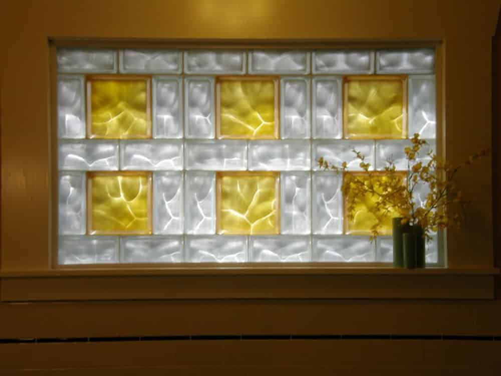Yellow 8 x 8 glass blocks with 4 x 8 clear blocks for a multi-sized glass block window design - Innovate Building Solutions 