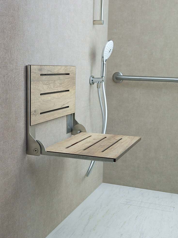 foldable shower bench seat shown along with grab bars for safety