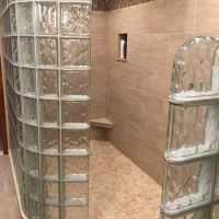 Ramped ready for tile shower pan with a curved and straight glass block walls - Innovate Building Solutions 