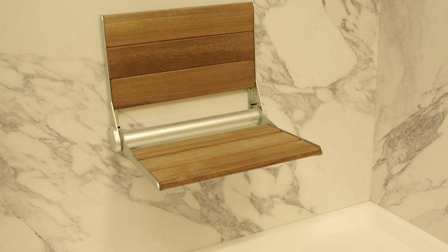Teak fold down seat in a 60 x 32 accessible shower - The Bath Doctor Broadview Heights Ohio 