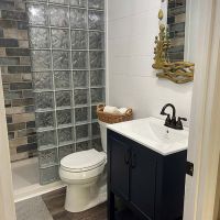 60" wide walk in shower using a glass block wall with finished end blocks - The Bath Doctor and Cleveland Glass Block 