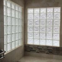 Ceramic tile walls with a 40" x 40" glass block high privacy windows - Innovate Building Solutions 