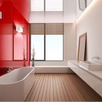 Free standing bathtub in a contemporary bath remodel with red high gloss wall panels in Moreland Hills - The Bath Doctor 
