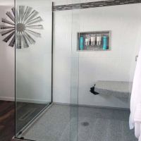Low profile barrier free shower with a cultured granite shower pan and sliding glass door - The Bath Doctor Strongsville Ohio 