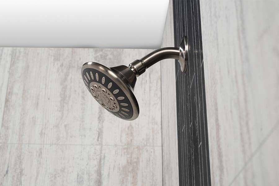Antique gray laminate will panels with a black accent trim in a roll in shower by The Bath Doctor 