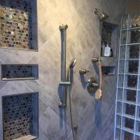 Shampoo and soap niches in a herringbone pattern glass block shower - Innovate Building Solutions 