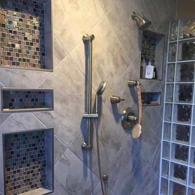 Multiple sized niches in glass block shower - Innovate Building Solutions 