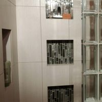Glass tile niche in a glass block shower using 4 x 8 clear glass blocks - Innovate Building Solutions 