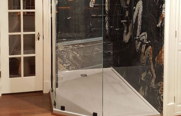 Neo angle shaped custom solid surface shower base with frameless glass for a walk in design 