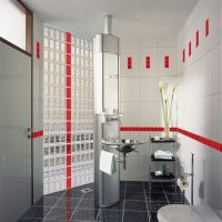 Glass block metric sized shower wall with a bright red stripe of glass blocks - Innovate Building Solutions 