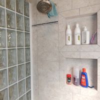 Shampoo and lotion niches in a ceramic tile shower - Innovate Building Solutions 