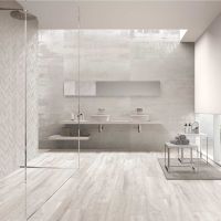 One slope wet room shower base in a luxury waterproof bathroom - Innovate Building Solutions 