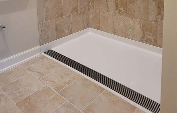 ramped shower pan linear drain