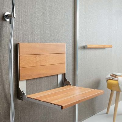 Teak fold-down seat 20 inch x 16 inch to save room in a safe shower - Innovate Building Solutions 