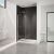 Walk-in alcove shower with glass shield and white pan
